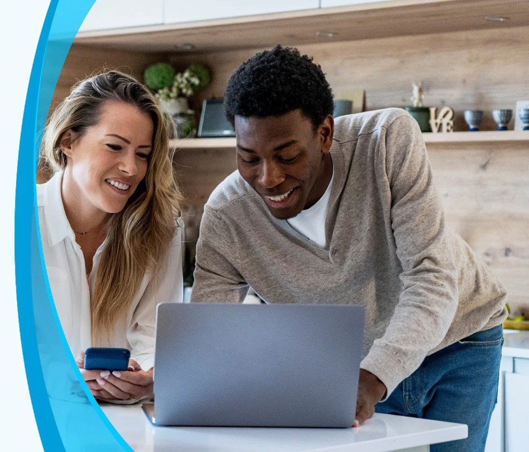 Couple enjoying fast fiber internet at home